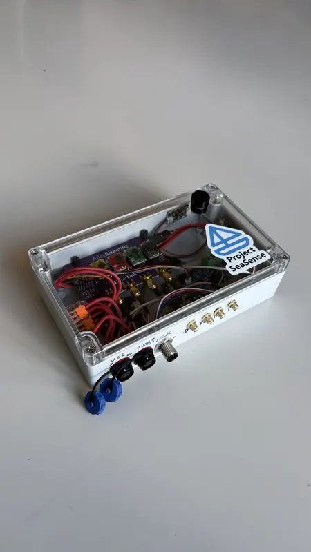 The Tier 2 water-quality module: a sealed enclosure with sensor connectors and the Project SeaSense logo
